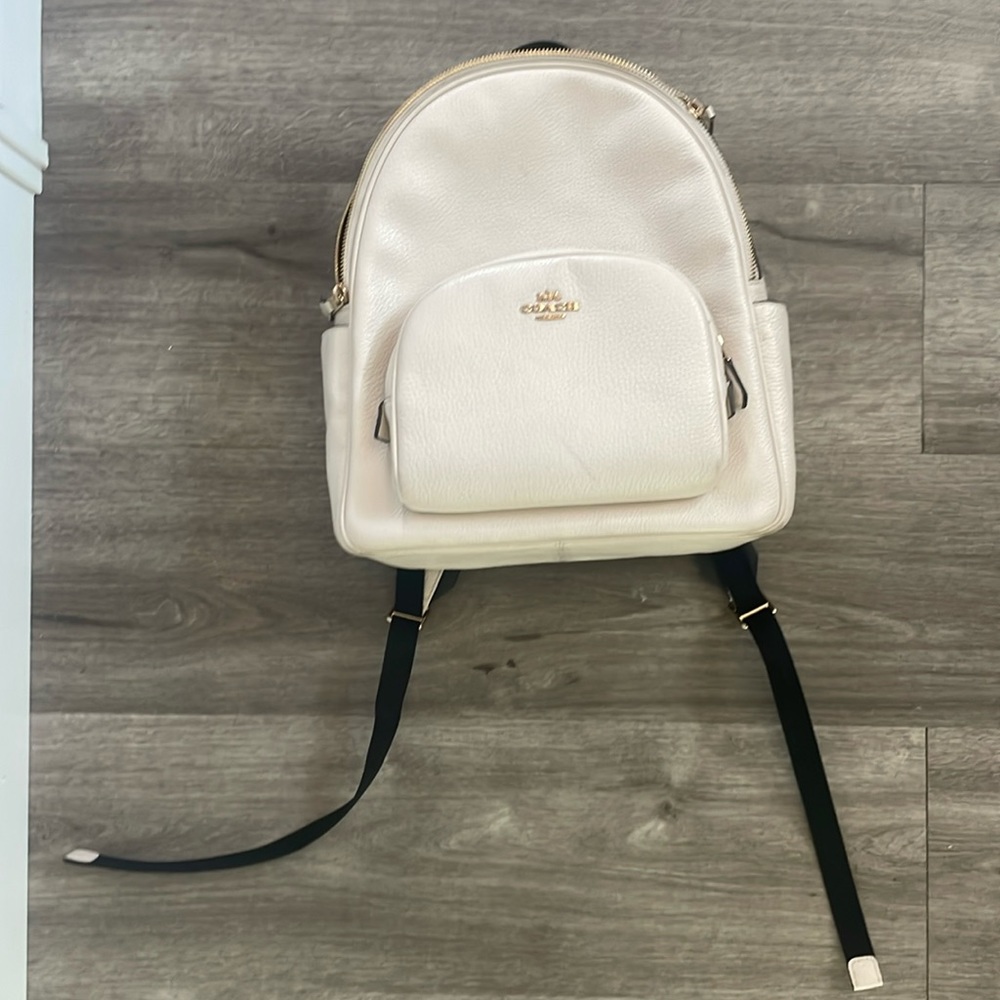Cream and black Coach backpack